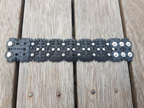 ISTRIAN ISLAND HOPPING COLLECTION- Grofica Zakovica- black laser cut cuff with cross patterning and studs